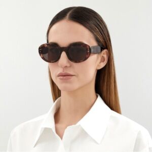 Alaïa Oval Shaped Sunglasses AA045S